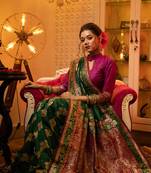 Green woven banarasi silk saree with blouse