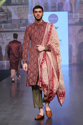 Maroon Coloured Sherwani With Olive Green Coloured Plazo Pants And Matching Stole