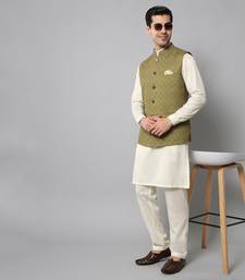 Wrinkle free olive green jacket with a plain creme kurta pants