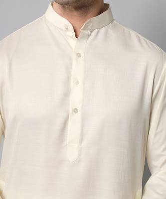 Wrinkle free Plain creme kurta with pants 4