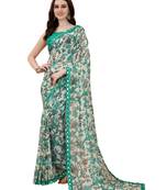 Green printed georgette saree with blouse