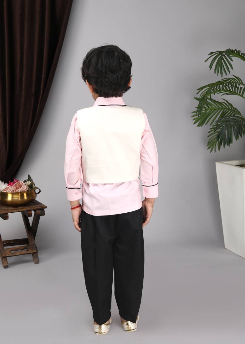 Pink shirt off white waist coat black pant