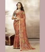 Orange embroidered pure georgette saree with blouse