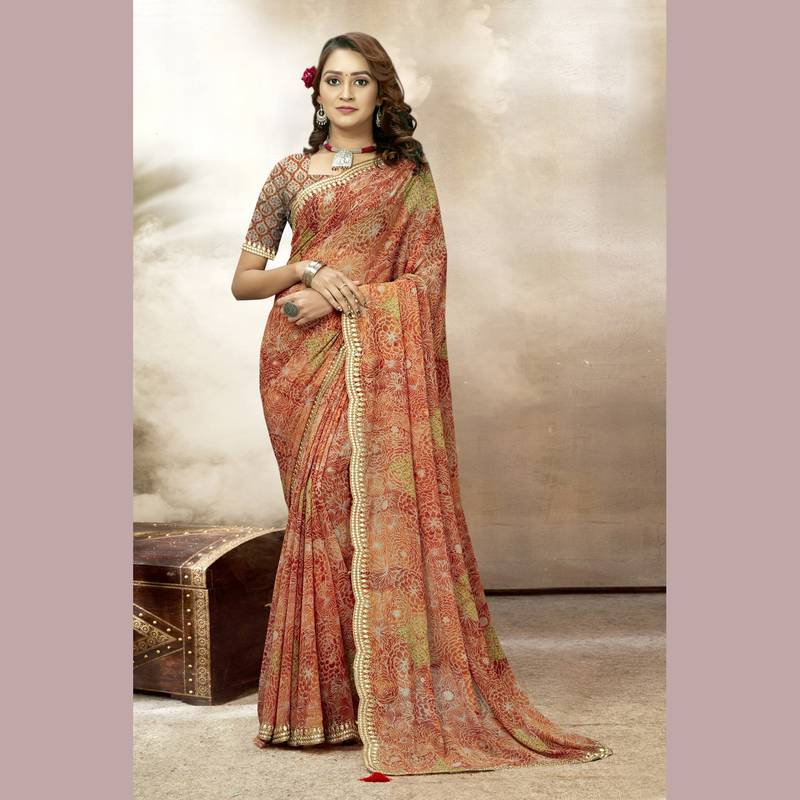 Orange embroidered pure georgette saree with blouse