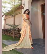 Orange embroidered pure chiffon saree with blouse