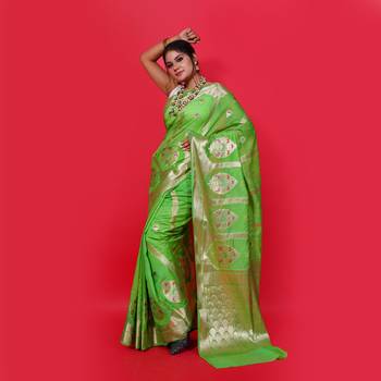 Green woven georgette saree with blouse 1