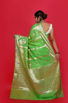 Green woven georgette saree with blouse