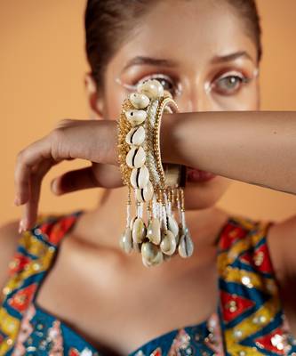 Shell tassel bangles (set of 2) 1