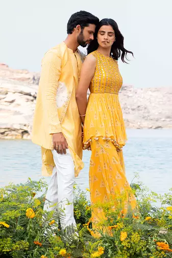 Featuring A Yellow Peplum Set With Sharara