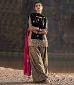 Featuring A Black Suit In Brocade With Salwar