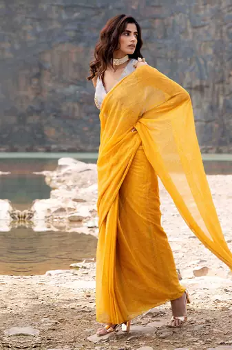 Featuring A Yellow Saare With Grey Blouse