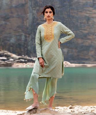 Featuring A Pista Green Pakistani Suit With Dhoti 3