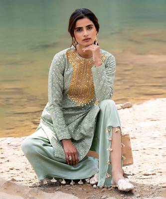Featuring A Pista Green Pakistani Suit With Dhoti 4