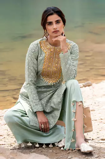 Featuring A Pista Green Pakistani Suit With Dhoti