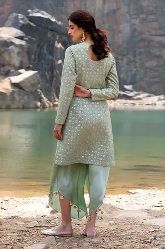 Featuring A Pista Green Pakistani Suit With Dhoti