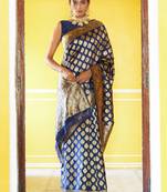 Janasya rashmika x saji saheli - women's navy blue banarasi silk woven ethnic motifs saree with unstitched blouse piece
