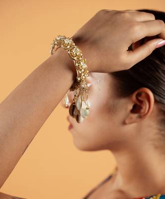 Shell tassel embellished bangles (set of 2) 1