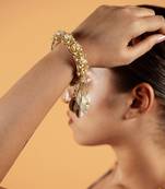 Shell tassel embellished bangles (set of 2)