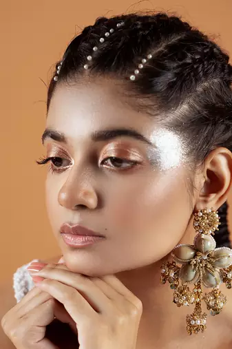 Floral shell embellished earrings