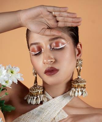 Shell embellished jhumka earrings 1