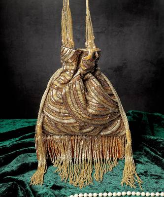 Gold glittering tassel potli bag 1