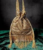 Gold glittering tassel potli bag