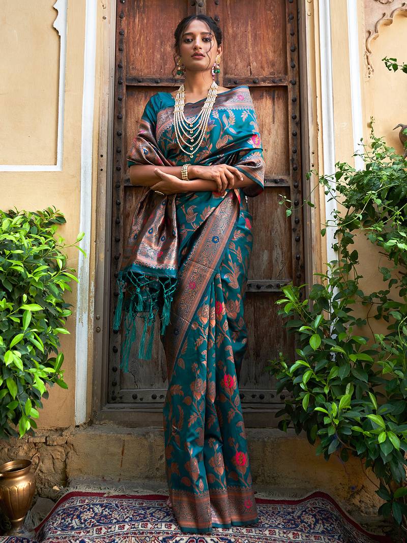 Janasya rashmika x saji saheli - women's teal green banarasi silk woven floral design saree with unstitched blouse piece