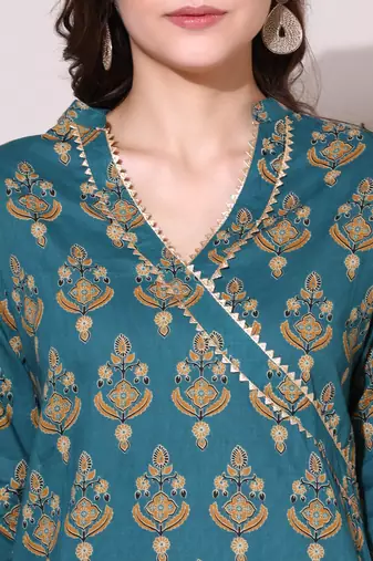 Anushil women cotton cambric v neck 3/4th sleeves printed kurti with golden lace work