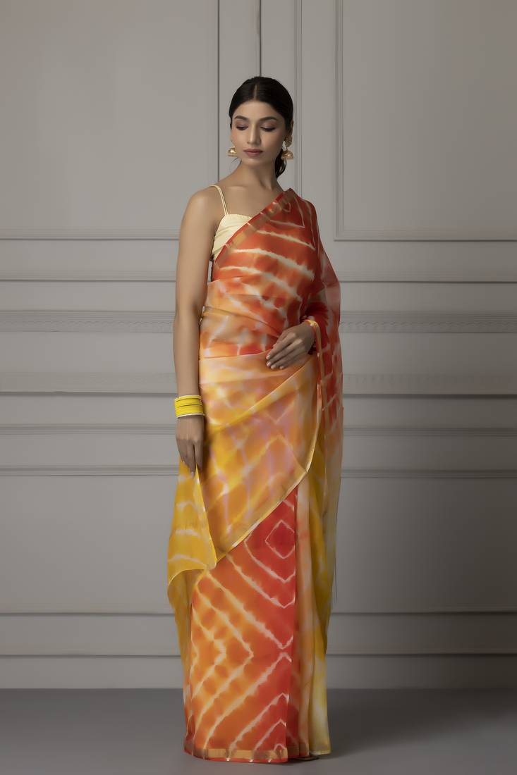 Yellow printed pure silk saree with blouse