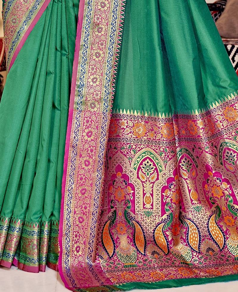 Sea green plain banarasi silk saree with blouse