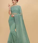 Rama embroidery paty wear contemporary net saree with blouse piece.