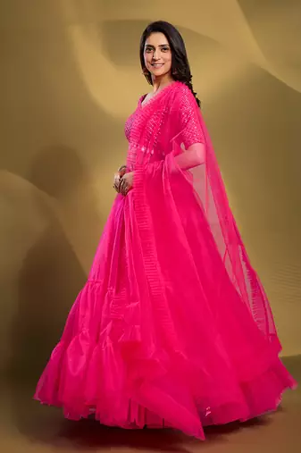 Pink Sequins Thread Embroidered Soft Net Semi Stitched Lehenga