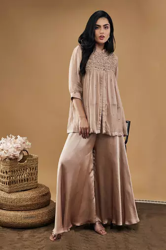 Mauve azra embellished top with flared pants