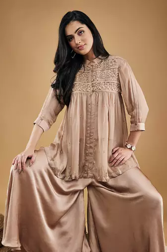 Mauve azra embellished top with flared pants