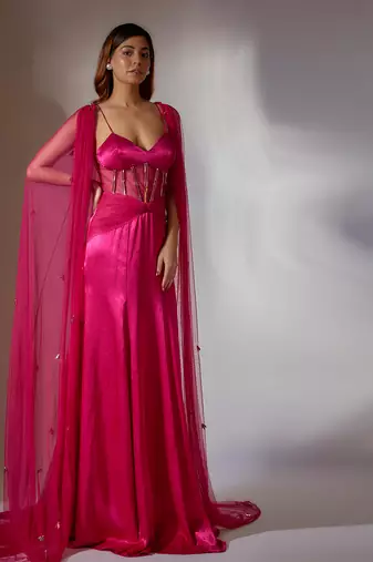 Hot pink embroidered gown with cape