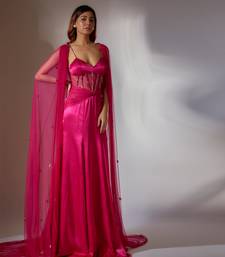 Hot pink embroidered gown with cape