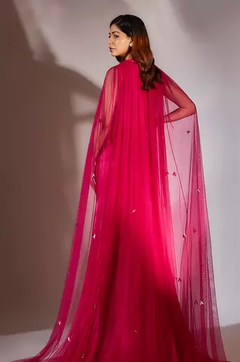 Hot pink embroidered gown with cape