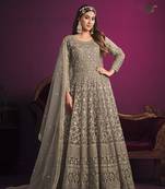 Grey color embroidered net anarkali suit