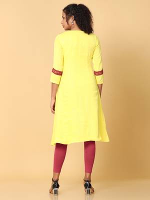 Hassu's women yellow 3/4th sleeves cotton solid a-line calf length v neck kurta 4