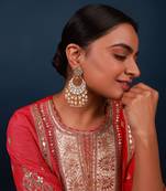 White & gold kundan earrings