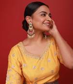 Pink and green kundan earrings