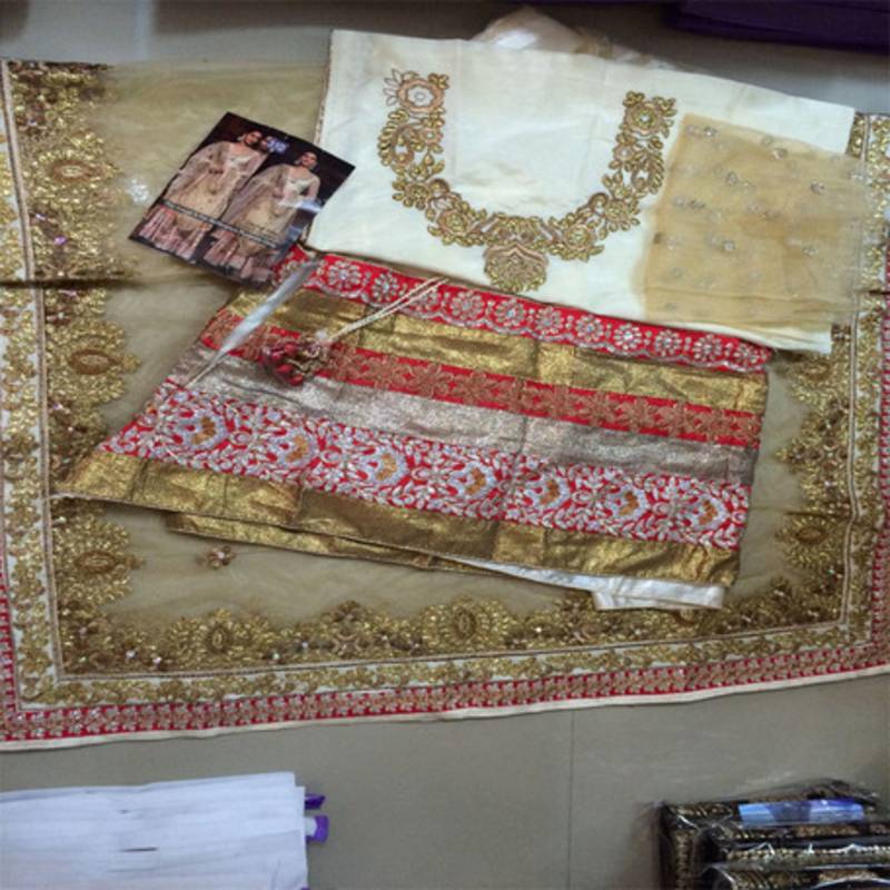 Gauhar Khan GOLD QUEEN Beige & Red Bollywood Style Lehenga Saree