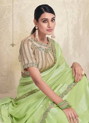 Light green georgette solid saree with unstitched blouse piece 3