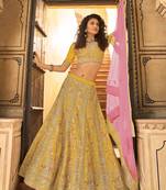 YELLOW SEQUINS SWAROVSKI DORI ZARKAN & THREAD EMBROIDERED ORGANZA FESTIVE BRIDAL  & PARTY WEAR SEMI STITCHED LEHENGA