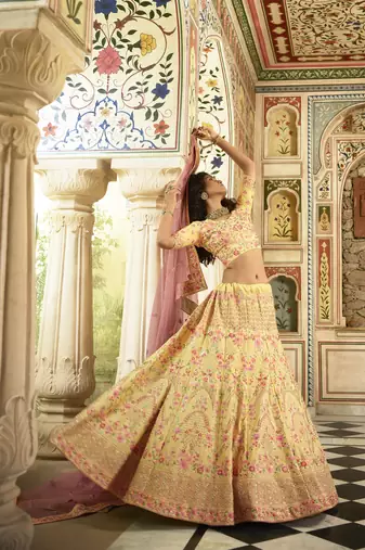 YELLOW SEQUINS SWAROVSKI ZARKAN & ZARI EMBROIDERED ART SILK FESTIVE BRIDAL WEDDING & PARTY WEAR SEMI STITCHED LEHENGA