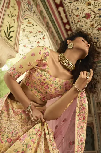 YELLOW SEQUINS SWAROVSKI ZARKAN & ZARI EMBROIDERED ART SILK FESTIVE BRIDAL WEDDING & PARTY WEAR SEMI STITCHED LEHENGA