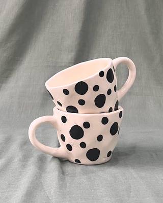 Whimsical Delight: Handmade Ceramic Mug  with Contrasting Black Polka Dots on Ivory-White Background 2