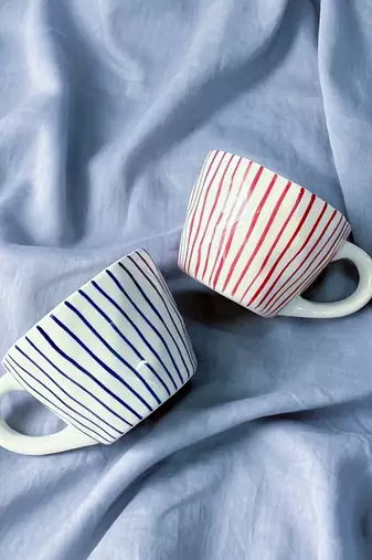Tranquil Harmony: Handmade Hand-Painted Blue Vertical Lines on Ivory-White Ceramic Mug