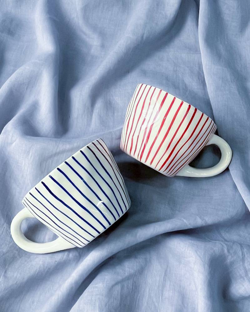 Tranquil Harmony: Handmade Hand-Painted Blue Vertical Lines on Ivory-White Ceramic Mug