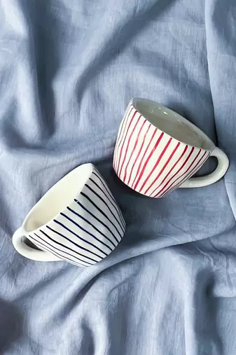 Tranquil Harmony: Handmade Hand-Painted Blue Vertical Lines on Ivory-White Ceramic Mug